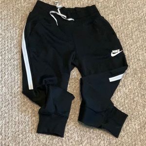 Nike Joggers Fleece Lined Black with white side strip and champagne gold stripe